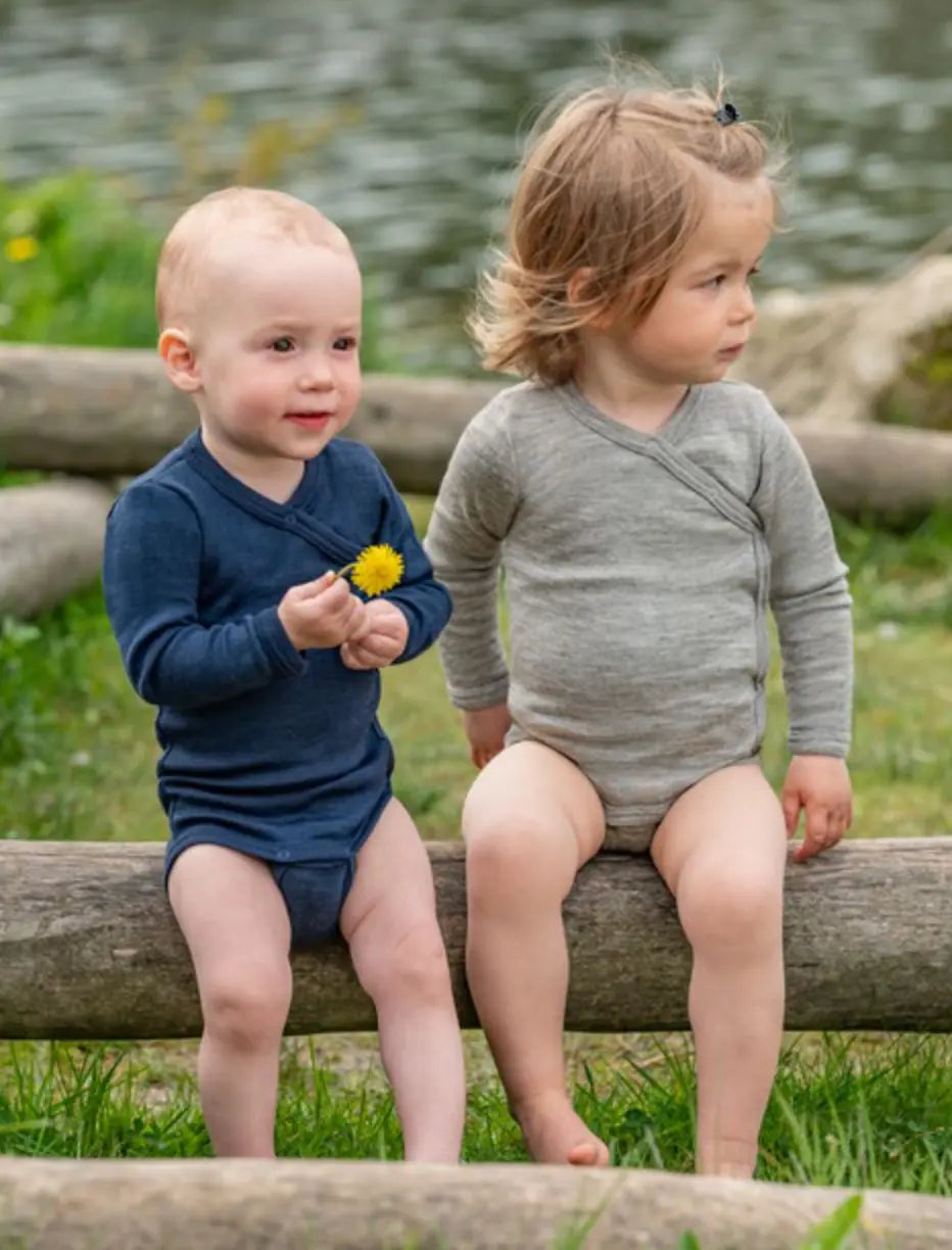 Long-sleeved Engel Natur wool and silk baby bodysuit with convenient snap closures on side and bottom