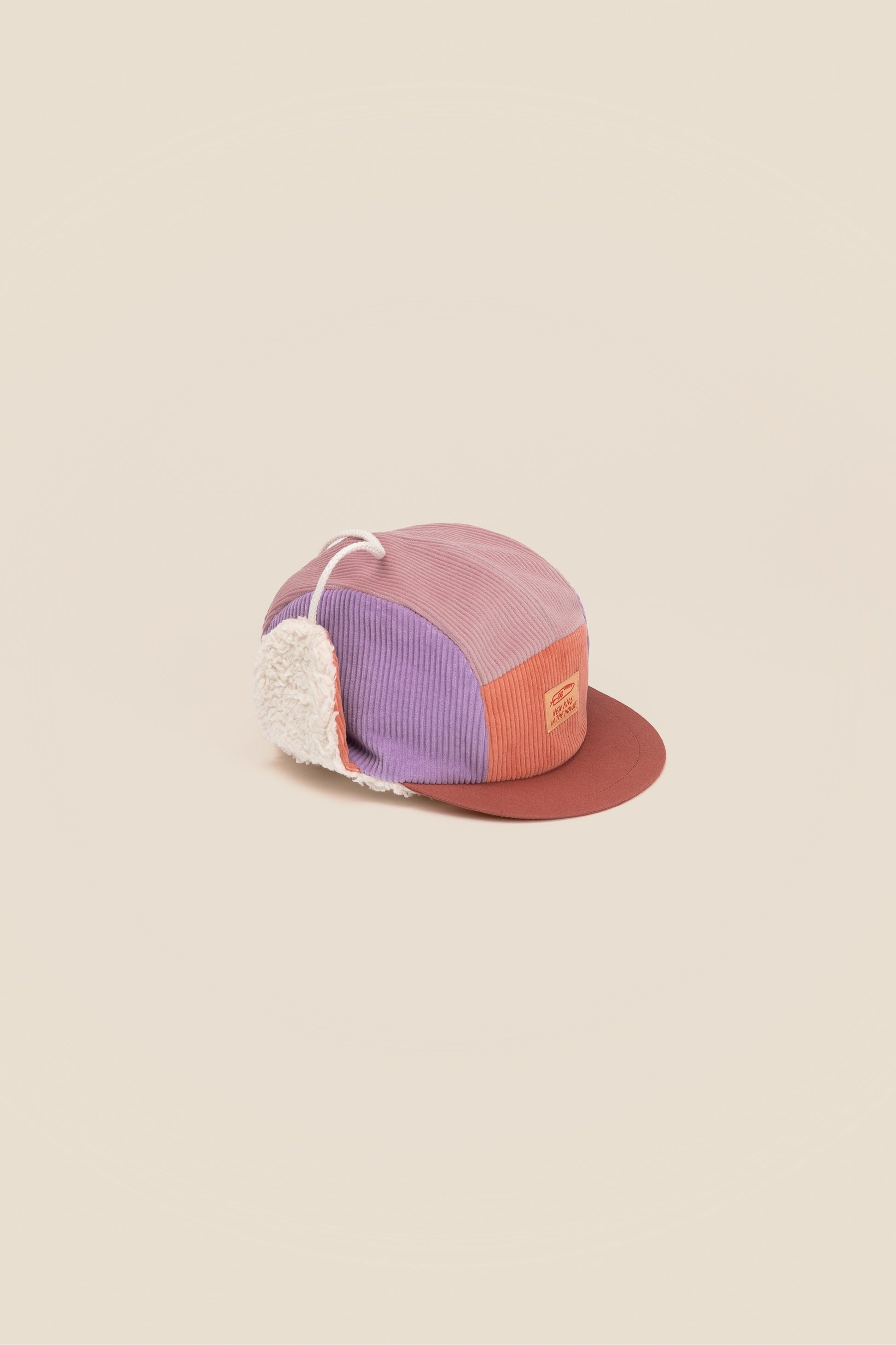 New Kids in the House Lorraine 5-panel corduroy kids and teen winter hat in plum – organic cotton plush lining, handmade in Germany.