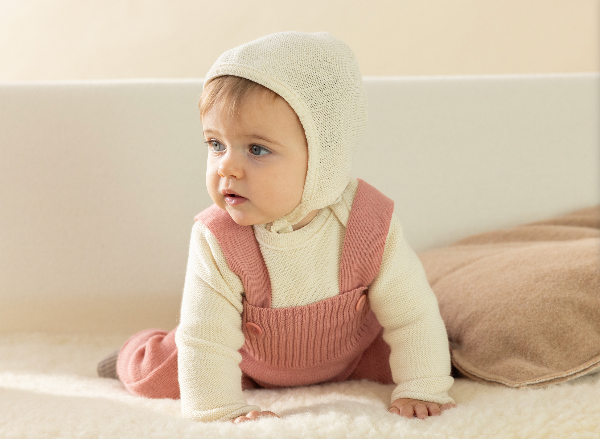 Disana knitted merino wool baby bonnet in soft organic wool